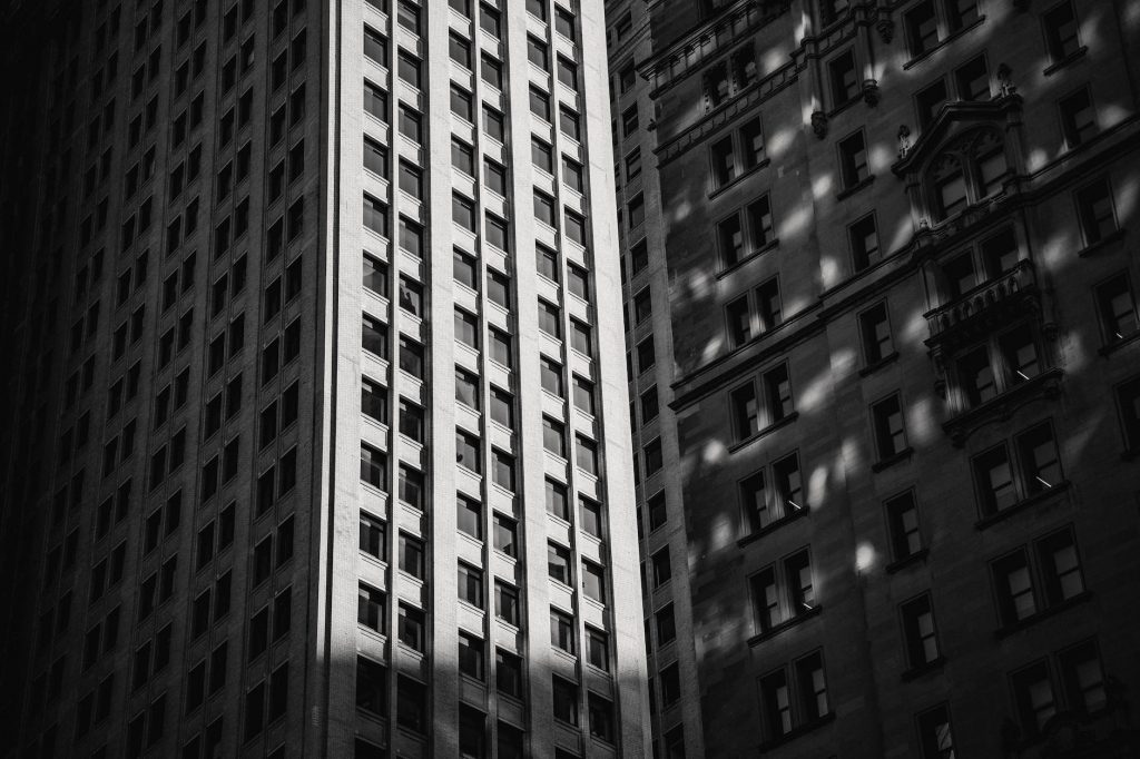 high rise building in city in sunny day